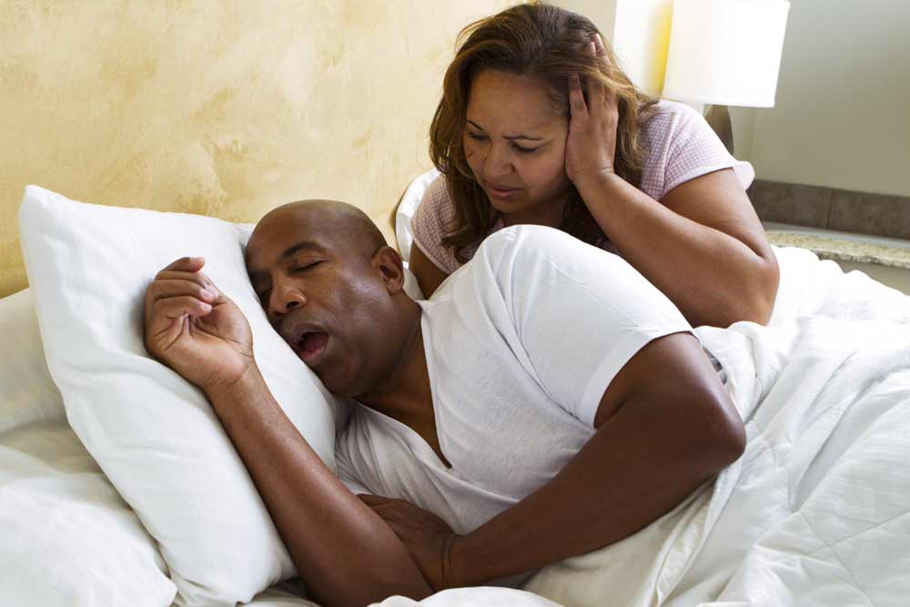 Woman upset with snoring partner